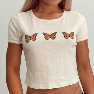 Pastel yellow cropped butterfly tee